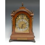 A Victorian gilt brass mounted oak bracket clock, 15cm arched brass dial with silvered chapter