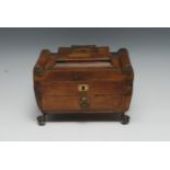 A Regency morocco leather scroll-end sarcophagus work box, hinged cover, drawer to base, double-