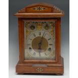 An early 20th century oak bracket clock, 16cm rectangular silvered dial with Roman numerals, Slow/