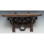 A 19th century Black Forest wall bracket, the superstructure carved with oak leaves, and in