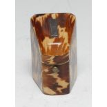 A Victorian tortoiseshell slope-top needle case, hinged cover enclosing graduated provision for