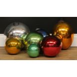 A substantial witch's ball, silvered finish, 24cm diam; others, various sizes and colours (8)