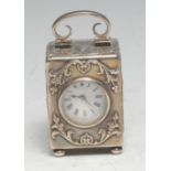 A late Victorian silver miniature carriage timepiece, 3cm enamel clock dial inscribed with Roman