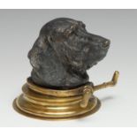 A 19th century Austrian cold painted bronze novelty desk inkwell, cast as the head of a dog,