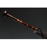 An early 20th century tortoiseshell-mounted parasol umbrella, domed knop above a tapering handle,