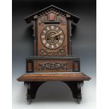 A Black Forest cuckoo clock, 16cm chapter ring with carved bone Roman numerals, twin-winding