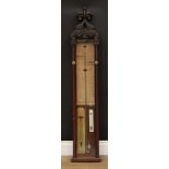 A Gothic Revival Admiral Fitzroy barometer, thermometer and storm glass, cased as one, 122cm high,