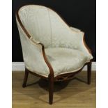 A 19th century French bergère en gondole, stuffed-over upholstery, tapered square legs, 97cm high,