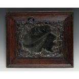 An Art Nouveau rectangular oak and bronzed mirror, signed with initials C.H., embossed and pierced