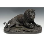 After Christophe Fratin (c. 1800 - 1864), a brown patinated animalier bronze, of a lion with hold of