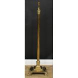 A brass floor-standing telescopic lamp, Corinthian column, stepped square base, paw feet, 133cm
