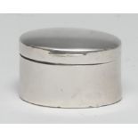 A George III silver oval nutmeg grater, quite plain, hinged cover enclosing a steel rasp, 3.5cm