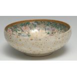 A Japanese Satsuma flared circular bowl, the interior painted in polychrome with peonies,