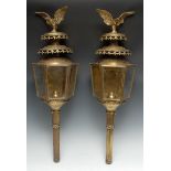 A pair of gilt brass coaching lamps, eagle crestings, hexagonal lanterns, 72cm high
