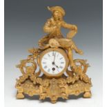 A 19th century French gilt metal figural timepiece, 7.5cm enamel clock dial with Roman numerals,