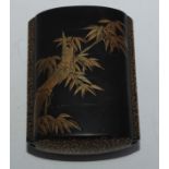 A 19th century Japanese black lacquer and gilt five section inro, finely decorated with scrolling