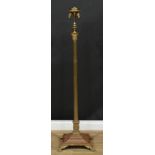 A brass floor-standing telescopic lamp, Corinthian column, stepped square base, paw feet, 146cm