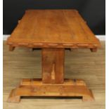 A French oak refectory dining table, rectangular top, substantial supports and sledge base,