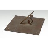 A George III brass sundial, etched with a chapter of Roman numerals, angular S-scroll gnomon, 20.5cm