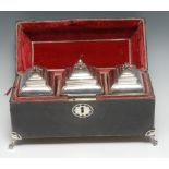 A set of three George II silver rectangular bombe shaped tea caddies, bird and fruit finials,