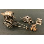 A miniature 930 silver bird box, ladder and figure stand, impressed marks; 800 silver grill; gilt