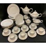 An Excelsior gilt and white dinner and tea set inc tea & Coffee pots, dinner plates, side plates,