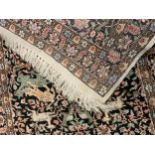 A hand-made, silk and wool mix, Kashan rug / carpet, 174cm x 91cm.