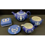 A Wedgwood cobalt blue King George VI coronation three piece tea set, impressed marks; Queen