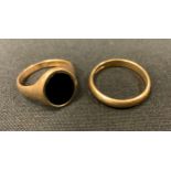 A 9ct gold black onyx inset oval signet ring, plain matrix, size T, 4.9g gross; a 9ct gold wedding