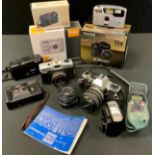 Cameras - an Olympus OM10 SLR camera, 35-70mm lens, Hanimex F-28 lens, Rollei digital camera etc qty