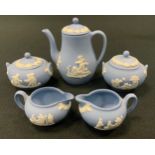 A miniature Wedgwood pale blue Jasperware coffee set, coffee pot, cream jug, sugar bowl etc (5)