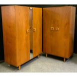 A retro design teak bed room suite comprising a double wardrobe, 170cm high, 120cm wide, 52cm