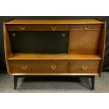 A retro G-plan sideboard fitted with drawers slide and full front cupboard doors, gilt and