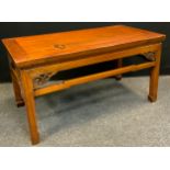 An oriental hardwood coffee table, 59.5cm high x 94cm long x 49cm wide