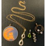 Jewellery - a gems Tv tanzanite 9ct gold seven stone pendant; white metal mounted peridot pendant;