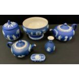 Wedgwood - a dark blue Jasperware pedestal bowl, 23cm diameter; ginger jar, large and small tea pots