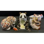 A Royal Crown Derby paperweight, Giant Panda, gold stopper. printed mark; others, Koala and Baby;