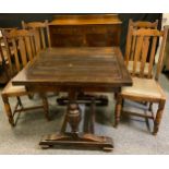 A 20th century oak draw-leaf table square top, 78cm high, 90cm deep; a 20th century oak sideboard,