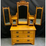 A 20th century satin-wood dressing table, rectangular bevelled mirror flanked by a cupboard door and