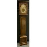 An early 20th century oak, small long-case clock, musical chime movement, triple winding holes,