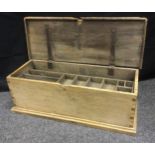 An early 20th century pine tool chest, sectional lift out tray, hinged lid, 31cm high, 90cm wide,