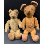 Teddy Bears - an early 20th century centre seam bear, short upturned nose, felt ears, button eyes,