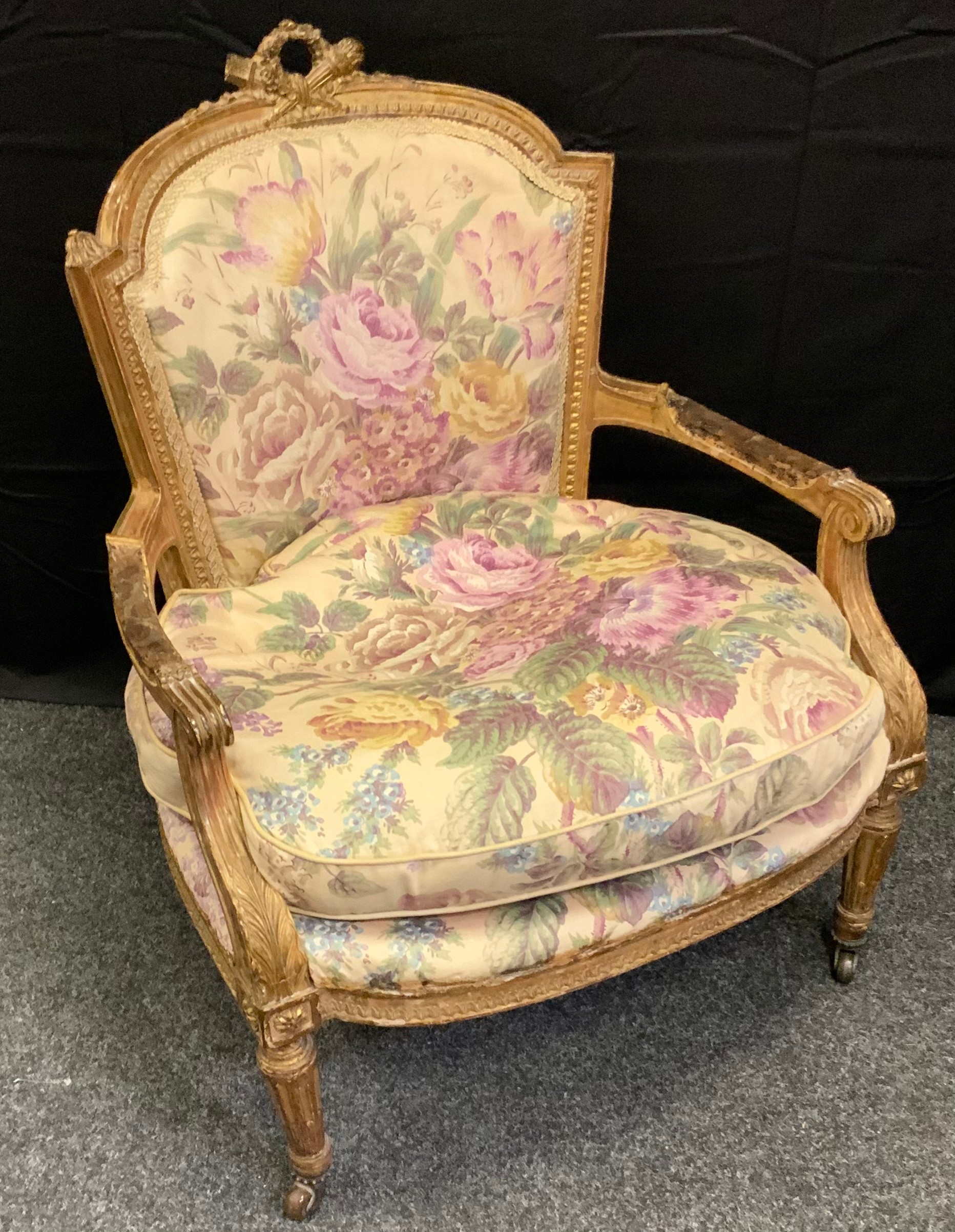 A 19th century Louis XV style giltwood parlour chair.