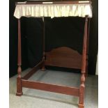A reproduction George III style four-poster double bed frame, turned and reeded supports, cream