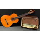 A Japanese Kimbara six string acoustic guitar, cased; vintage Thorn Ferguson valve radio, model