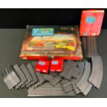 A Triang Minic Motorways playset, two vehicles, assorted track etc, part boxed