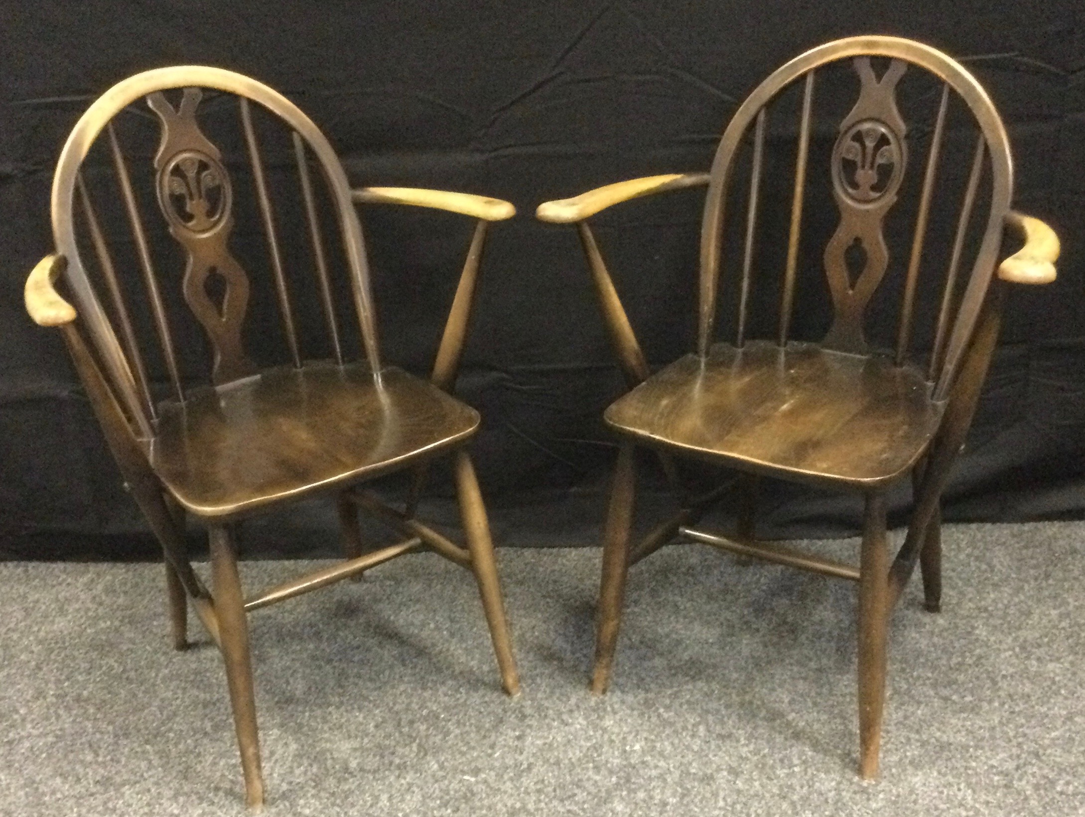 A pair of Ercol Fleur De Lys Windsor carver chairs, Old Colonial range c.1965