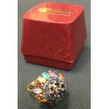 A mid 20th century multi colour conical dress ring, yellow metal shank stamped 18k, Siam, 7.8g gross