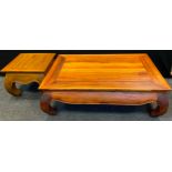 A Chinese hardwood coffee table or opium table, 37.5cm tall x 119.5cm wide x 79.5cm deep; another