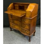 A reproduction inlaid walnut french style writing desk bureau, shaped top with fall front over